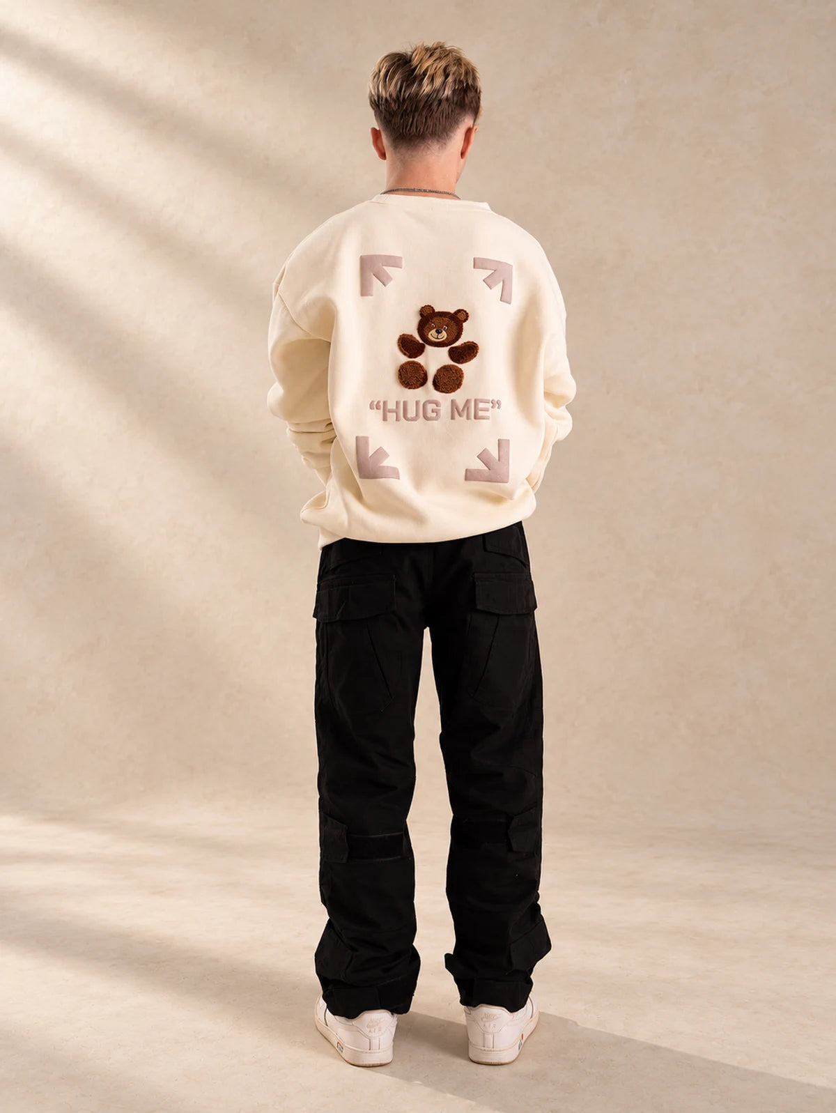 Hug Me sweater in beige, teddy and arrow back design
