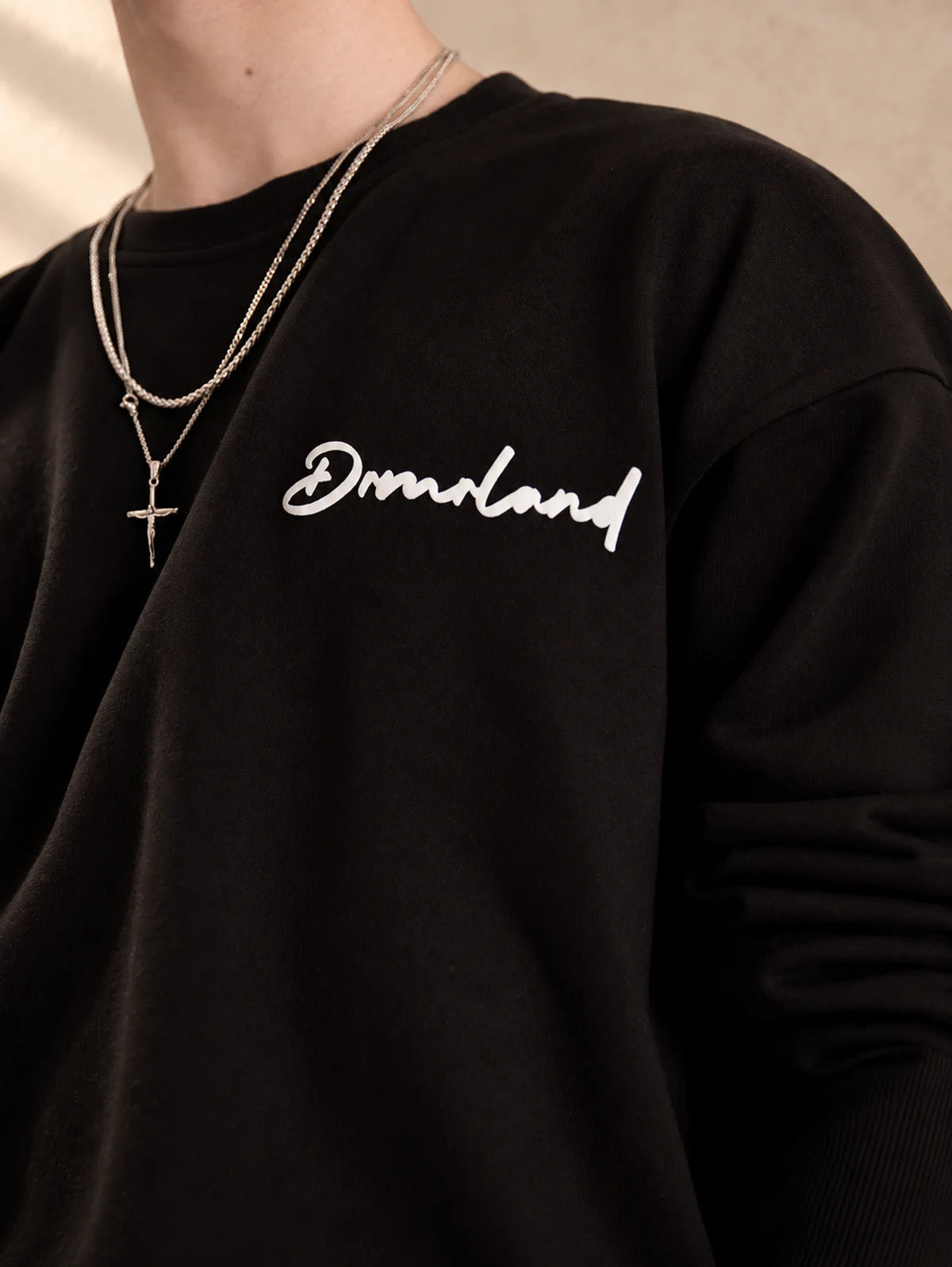Hug Me sweater in black, front script detail