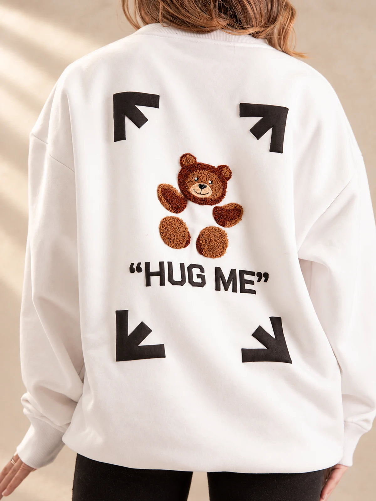 Hug Me sweater in white, teddy and arrow back design
