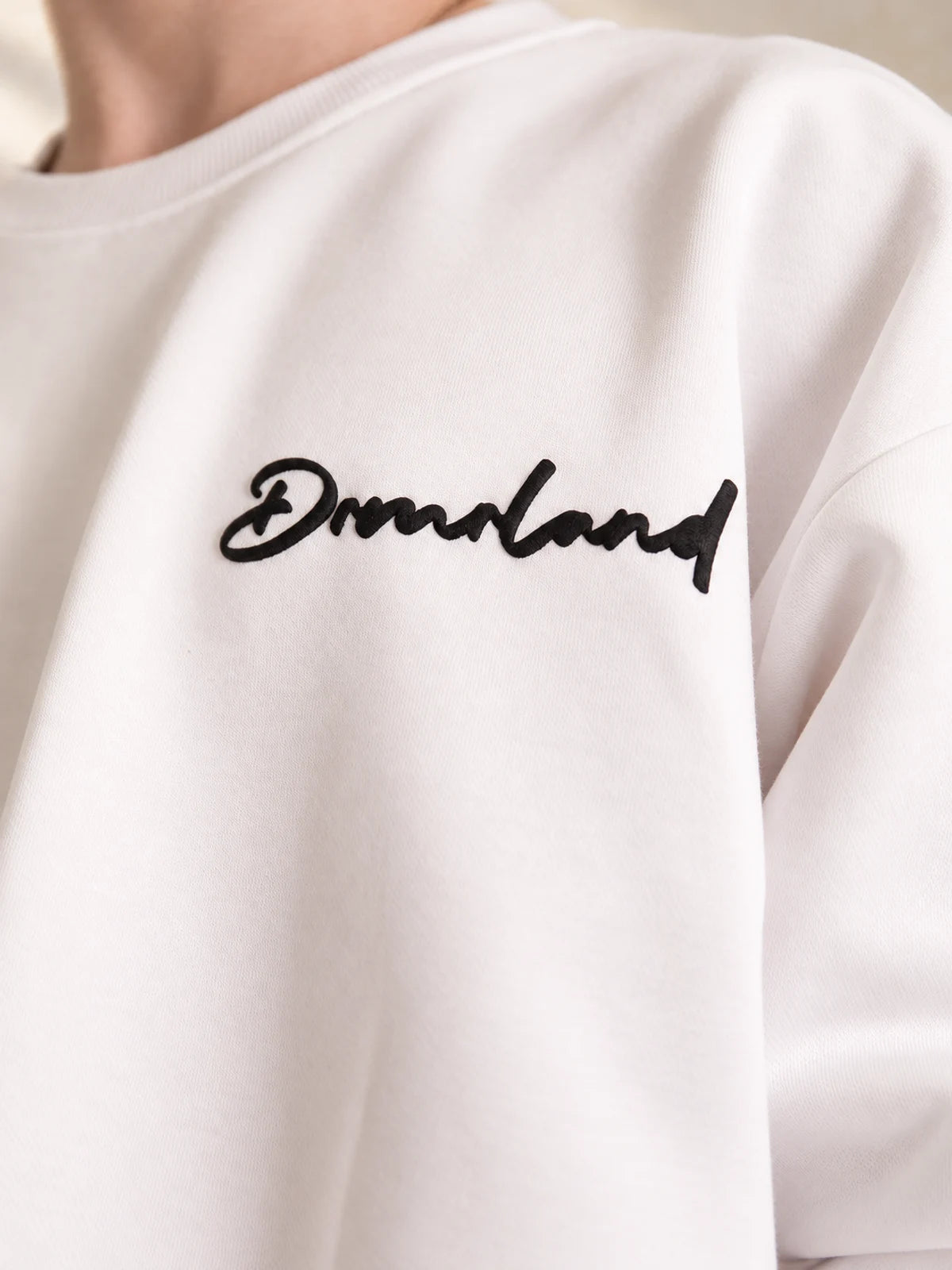 Hug Me sweater in white, front script detail