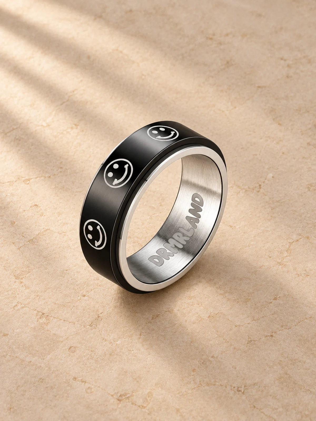 Smiley Fidget Ring, black rotating band and silver interior