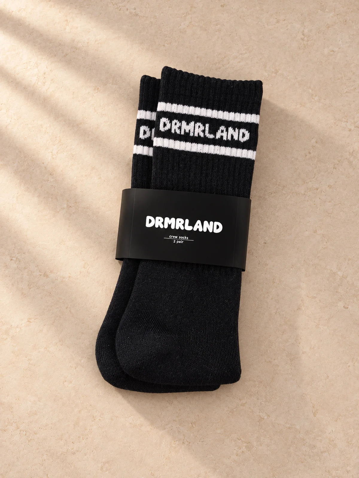 DRMRLAND crew socks in black, two-pair pack